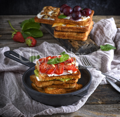 a pile of French toast from white bread with cottage cheese in a
