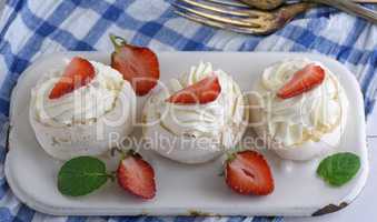 baked meringue with cream and fresh strawberries