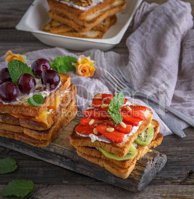 French toast from white bread with cottage cheese, strawberries