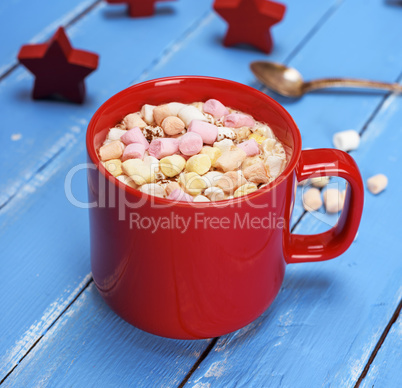mug with hot chocolate and small pieces of marshmallow