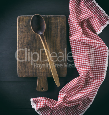 old brown wooden spoon and board
