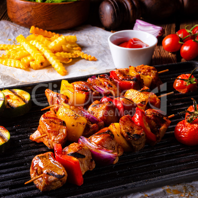 Rustic shish kebab skewers with marinated ham meat paprika and r