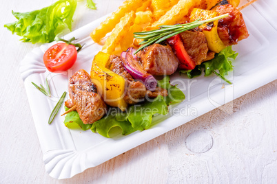 shish kebab skewers with marinated ham meat paprika and red onio