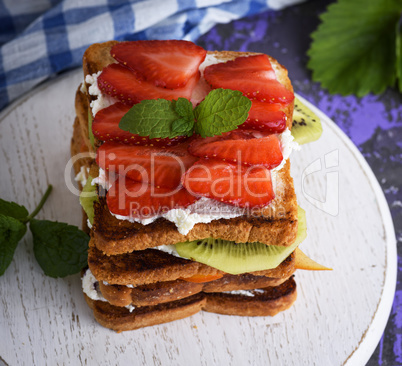 French toast with cottage cheese, strawberries, kiwi and blueber