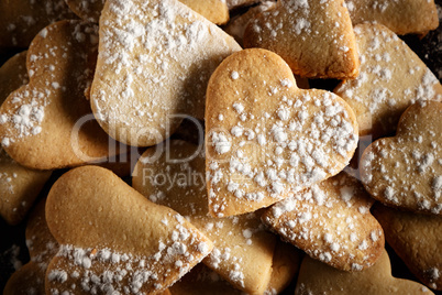 Home-made heart-shaped cookies background.