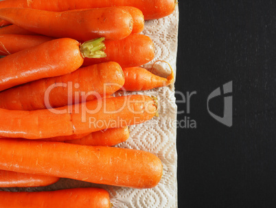 Fresh organic carrots, top view