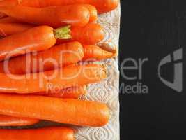 Fresh organic carrots, top view
