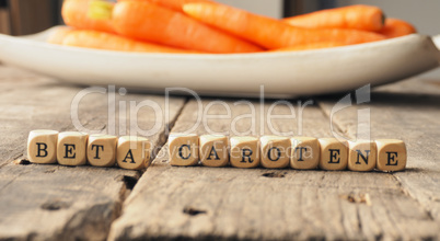 Beta carotene on wooden dices