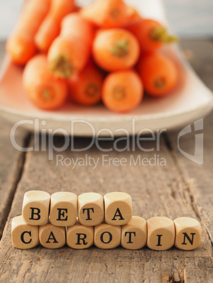 German Beta carotene on wooden dices