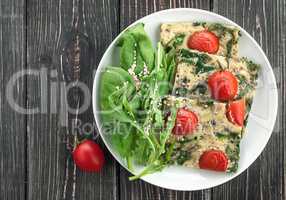 Frittata with spinach and tomatoes