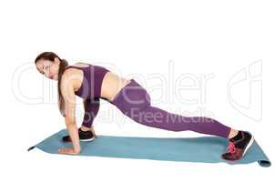 Slim woman stretching her body