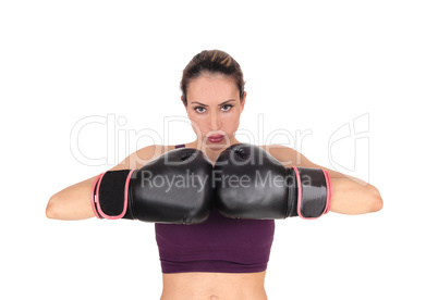 Woman with boxing gloves looking, smiling