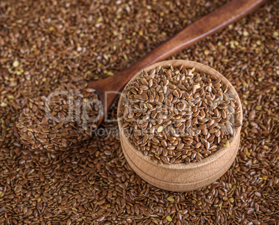 flax seeds in a wooden bowl