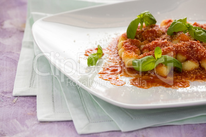 Gnocchi, Italian pasta with tomato sauce basil and parmesan chee