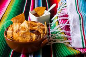 Nachos chips in an earthenware bowl