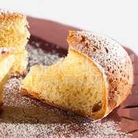 Slice of custard pie on white background