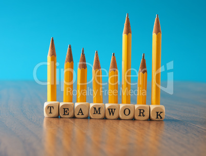 Teamwork concept with yellow pencils