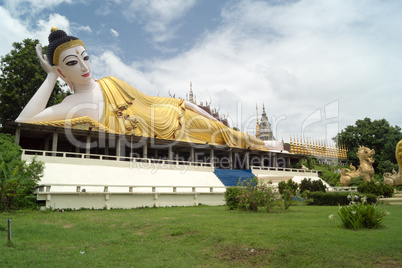 lying buddha in a newly built temple