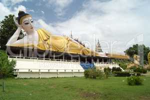 lying buddha in a newly built temple