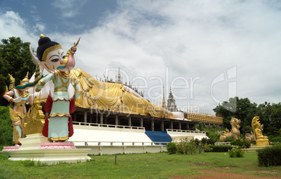 lying buddha in a newly built temple