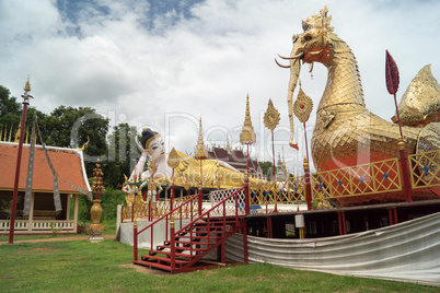 lying buddha in a newly built temple complex in thailand