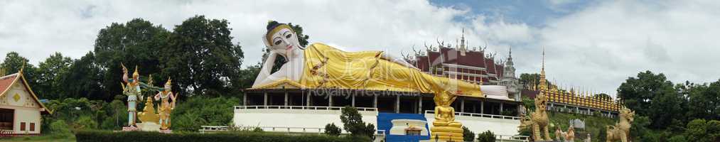 lying buddha in a newly built temple