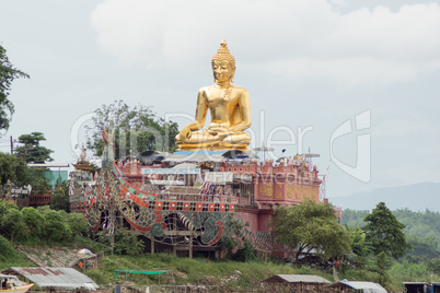 sitting golden buddha at golden triangle