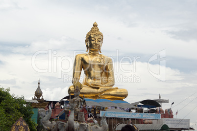 sitting golden buddha at golden triangle
