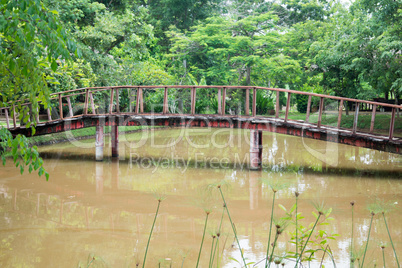 Bridge over water- garden restaurant in Yungkhao
