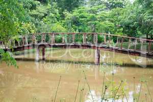 Bridge over water- garden restaurant in Yungkhao