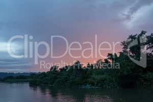 Boat trip on the river Kwai with sunset