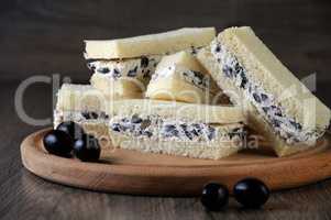 Sandwiches with ricotta and olives