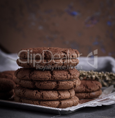 a stack of round chocolate chip cookies