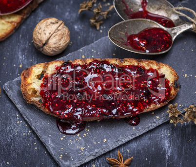 fried piece of bread with raspberry jam