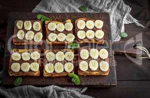 French toasts with chocolate and banana slices