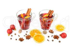 Hot red mulled wine isolated on white background with spices, or