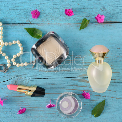 Set of decorative cosmetics on wooden table. Flat lay, top view.