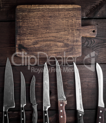 used kitchen knives and  cutting board