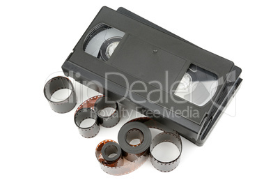 A set of video tapes and photographic film isolated on white bac
