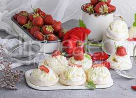 meringue with cream and fresh strawberries