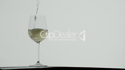 White vine poured in glass goblet
