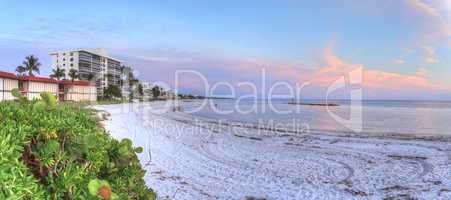Lowdermilk Beach sunset over powder white sand