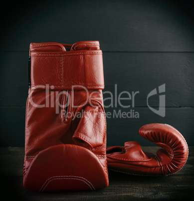 pair of red leather gloves for boxing