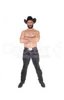 Shirtless man with a cowboy hat an his arms crossed