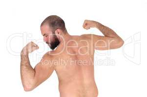 Man standing from back shirtless showing his muscles