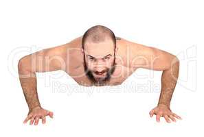 Man with beard doing push ups on the floor
