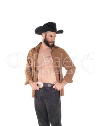 Young man with open shirt and cowboy hat