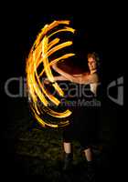 woman shows fire flares in the dark