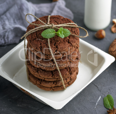 stack of round chocolate biscuits tied with a rope
