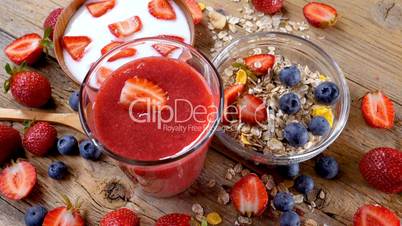 Healthy breakfast with strawberry smoothie and yogurt